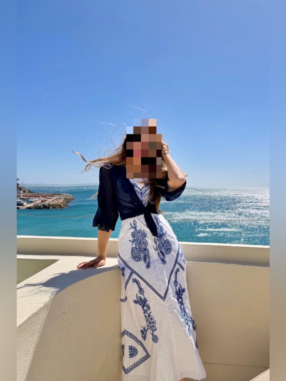 Zara’s Embroidered midi dress